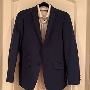 Marc New York suit and Michael Kors dress shirt.